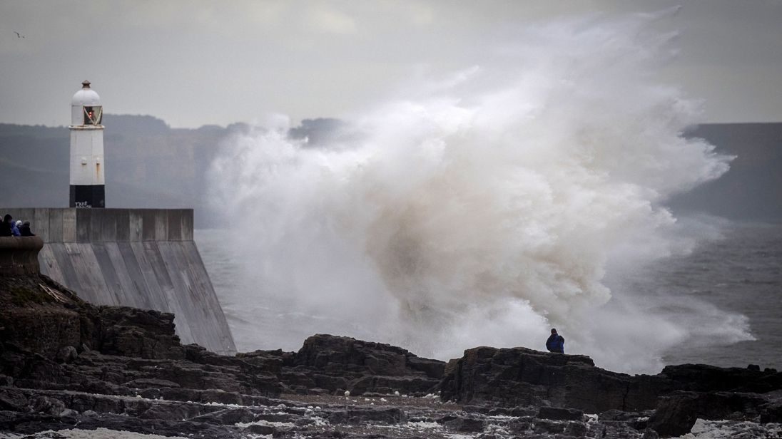 Waves hit the seafront in Porthcawl, Wales