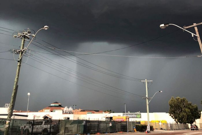 Dark clouds loomed over Morley as the storm front moved across Perth's northern suburbs