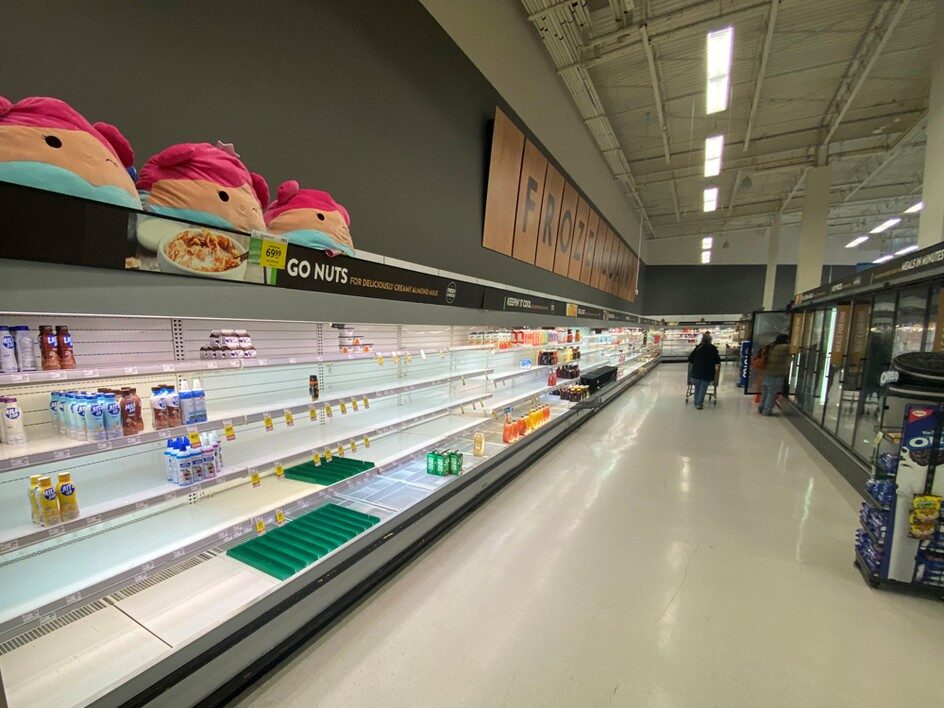 Near-empty shelves line a grocery store in Kelowna this week, following catastrophic flooding in British Columbia.