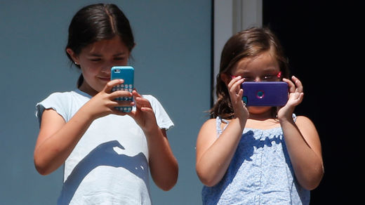 Children with cellphones