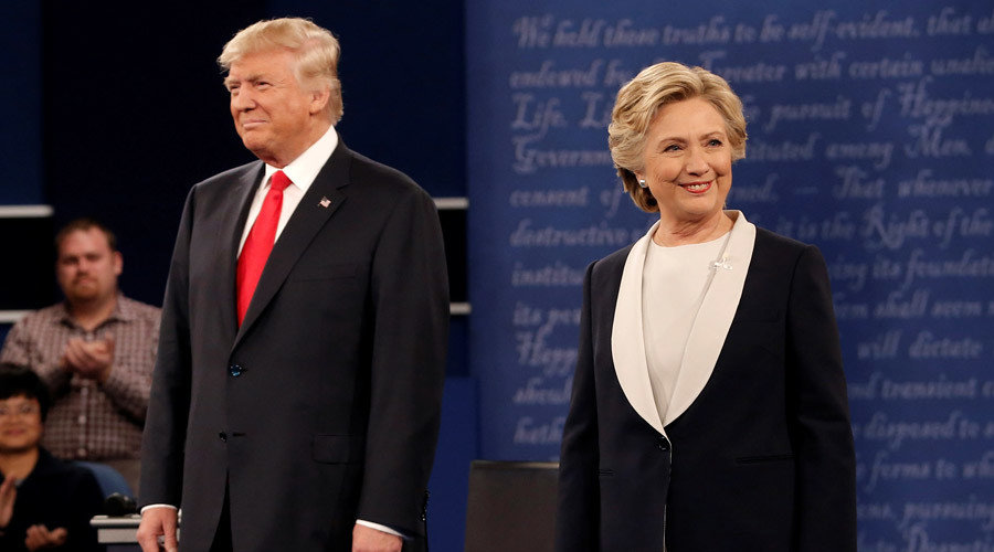 Republican U.S. presidential nominee Donald Trump and Democratic U.S. presidential nominee Hillary Clinton appear together during their presidential town hall debate at Washington University in St. Louis, Missouri, U.S., October 9, 2016.