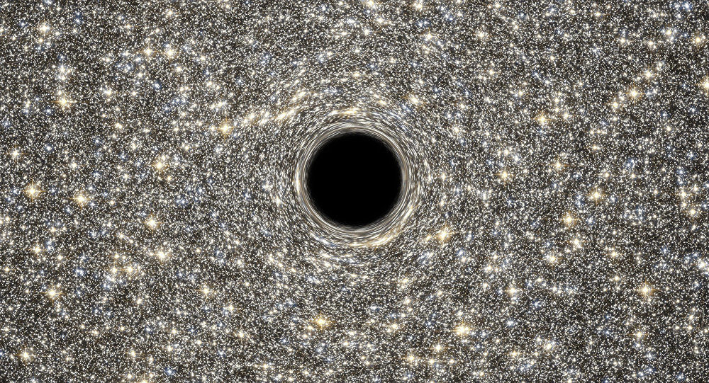 Goddard Space Flight Center / Hubble Helps Find Smallest Known Galaxy Containing a Supermassive Black Hole