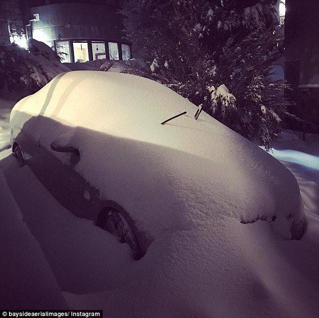 The record levels of falls in some areas led to cars being completely covered in the thick snow