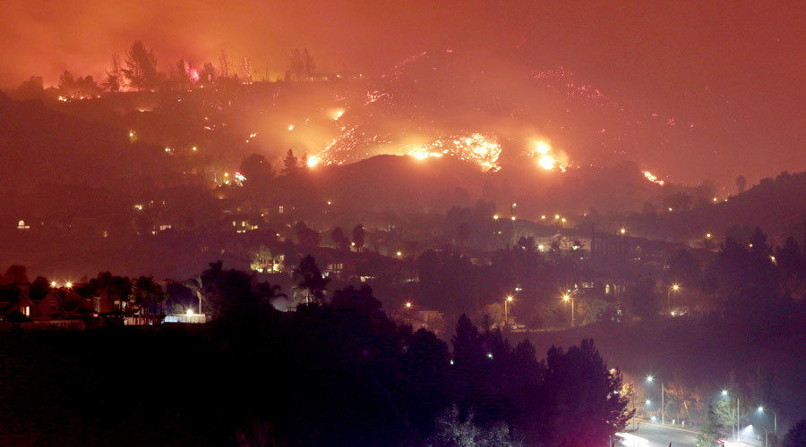 The Canyon Fire burns in Corona, California