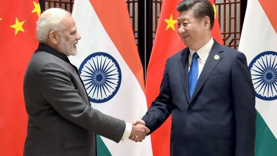 El primer ministro Narendra Modi y el presidente chino Xi Jinping en la IX Cumbre del BRICS en Xiamen.