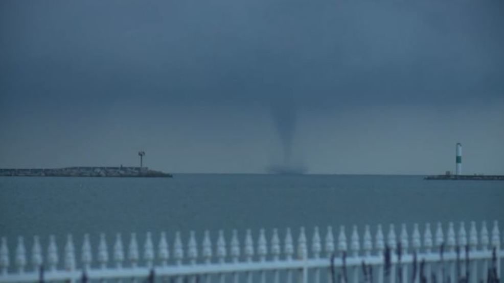 A waterspout is captured over Lake Michigan in Milwaukee, August 17, 2018.
