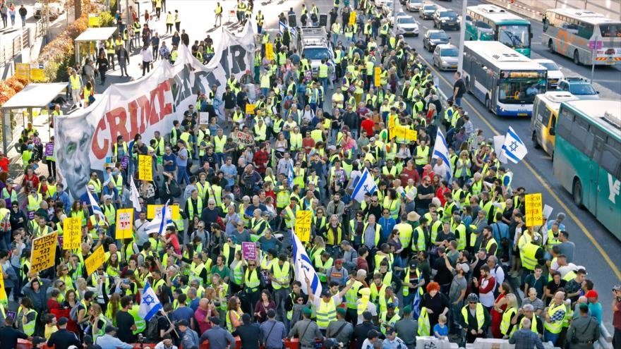 Israelíes se manifiestan contra las condiciones de vida y la corrupción en Tel Aviv, 14 de diciembre de 2018.