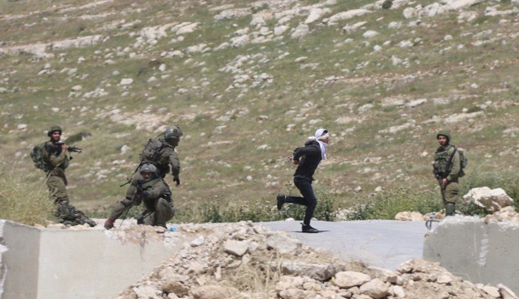 Palestinian teenager Israeli soldier