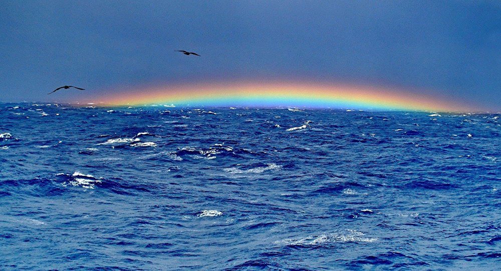 ocean sea bermuda triangle rainbow