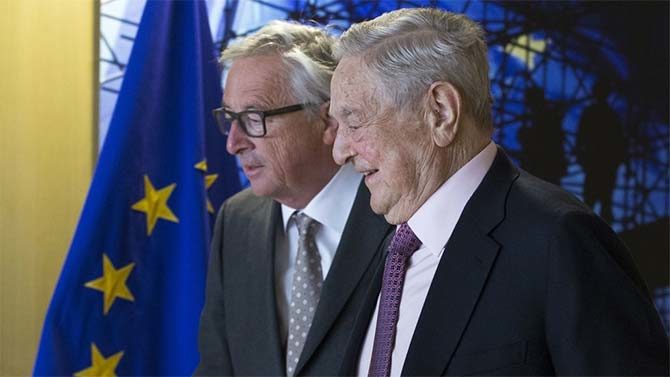 Jean-Claude Juncker, ex presidente de la Comisión Europea, con George Soros
