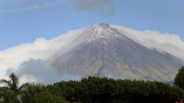 Mount Taranaki was cloaked in cloud and wearing a fresh dusting of snow on Sunday morning.