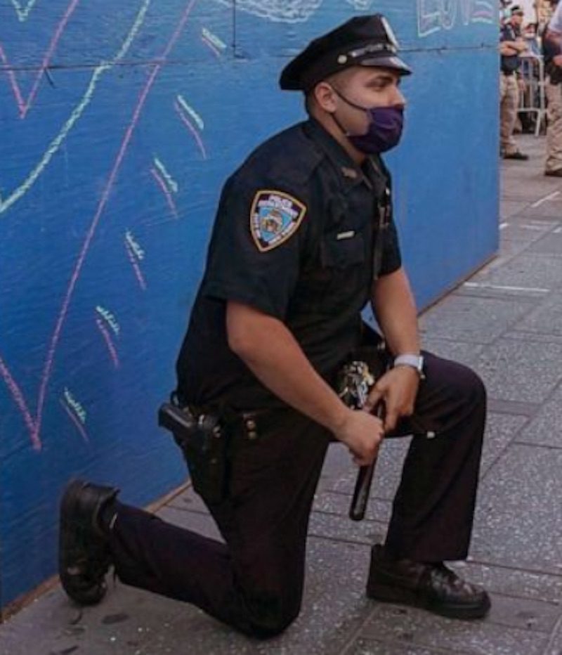 kneeling cop