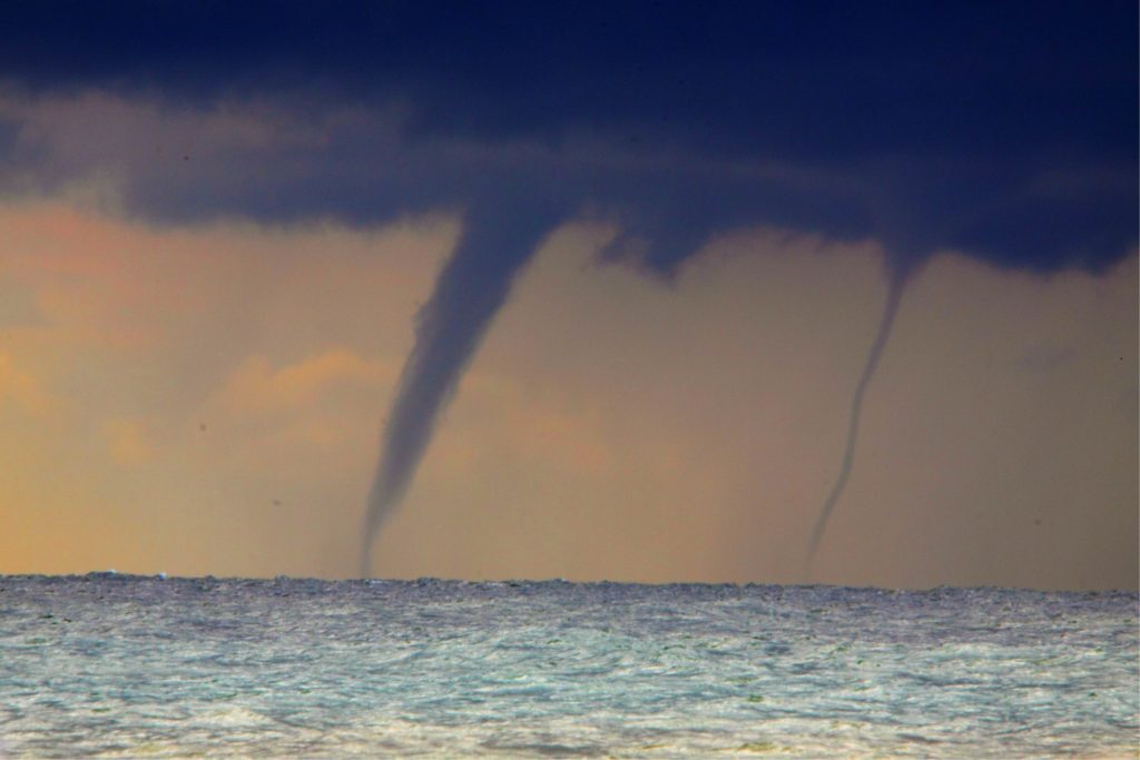 Waterspouts over open water.