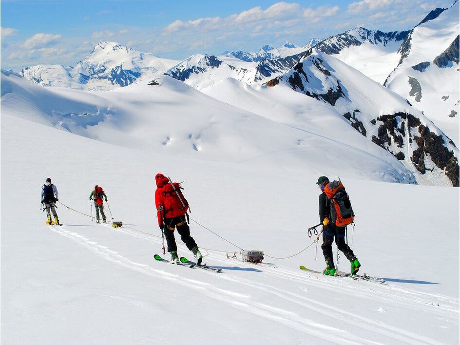 Ben Pelto, Kindy Gosal, Alexandre Bevington and Jesse Milner take radar measurements while towing the radar high on the Nordic Glacier in the southern B.C. Interior.