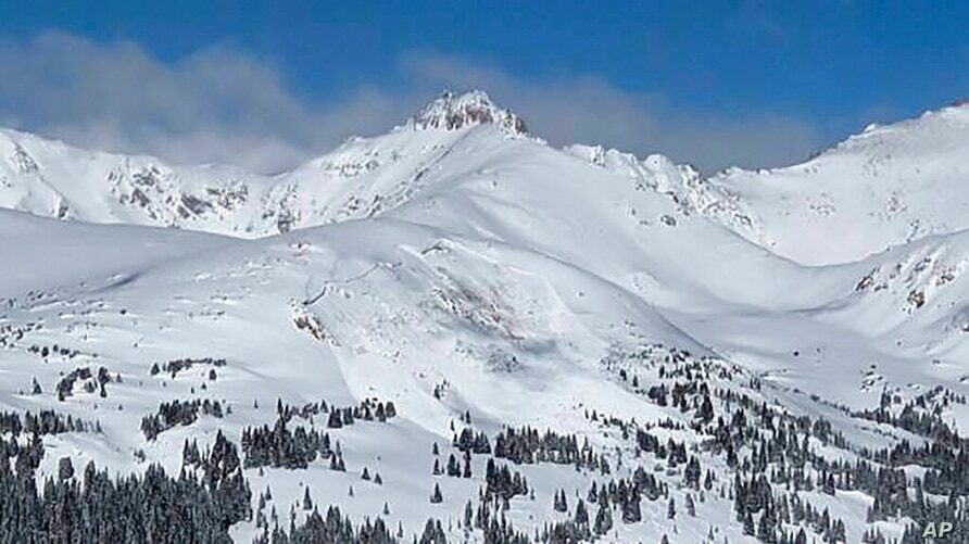This image provided by Colorado Avalanche Information Center shows an avalanche that killed an unidentified snowboarder on Sunday, Feb. 14, 2021, near the town of Winter Park in Colorado.
