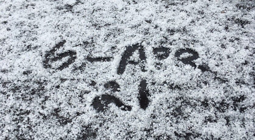 A sign in snow in Amsterdam. 6 Apr 2020