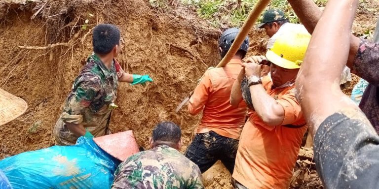 Rescuers search through landslide debris in Padang Pariaman Regency, Indonesia, September 20201.
