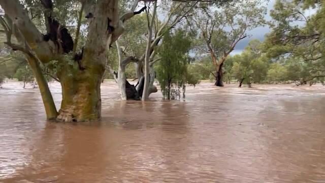 Usually Dry River Overflows During Record Rainfall in Alice Springs