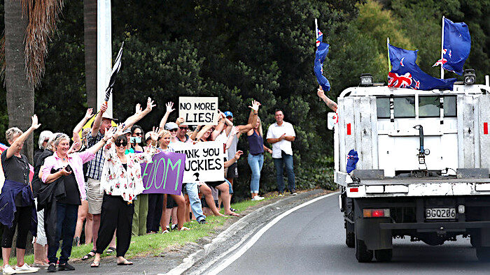 Crowd waves truck
