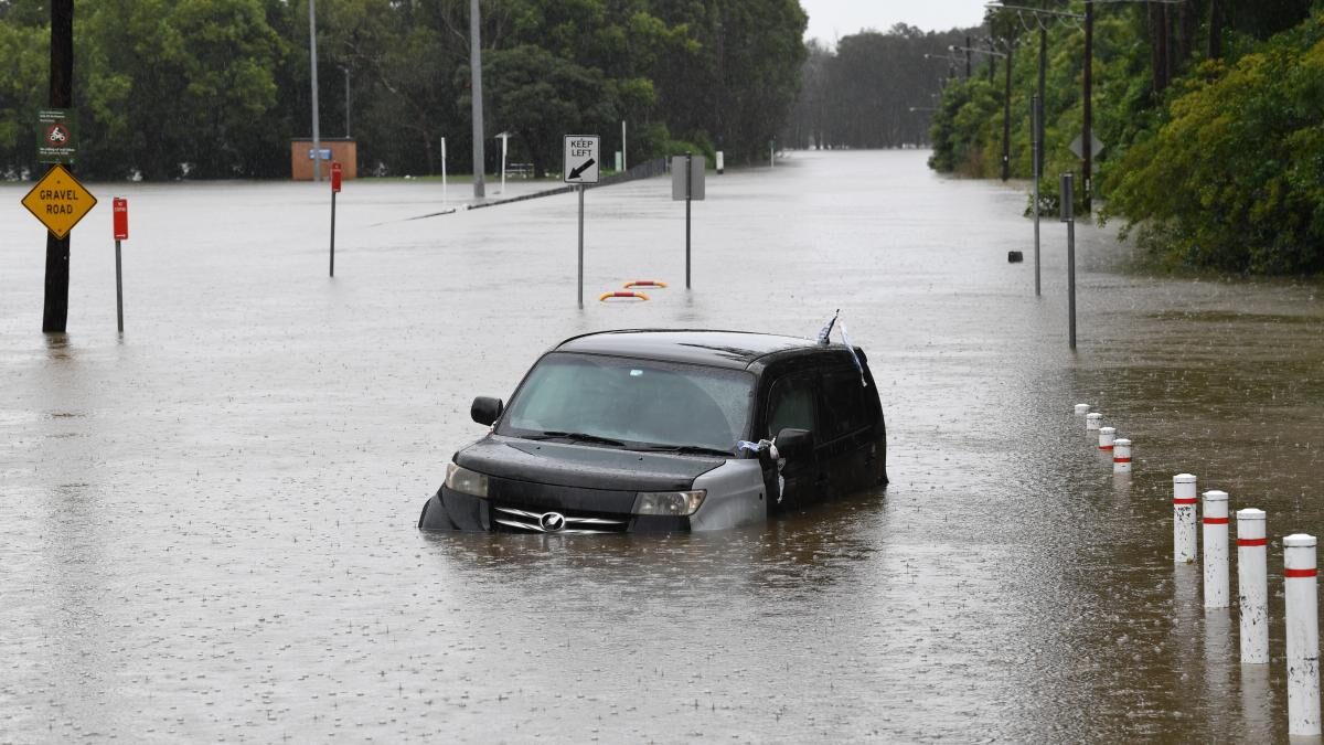 Two die in Sydney as Australia flooding intensifies
