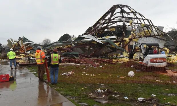 Workers begin cleanup at an elementary school