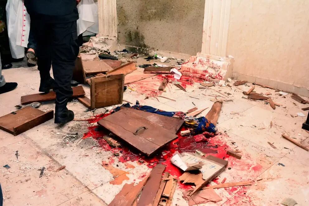 Más de 50 cadáveres quedaron tendidos en el piso de la iglesia.