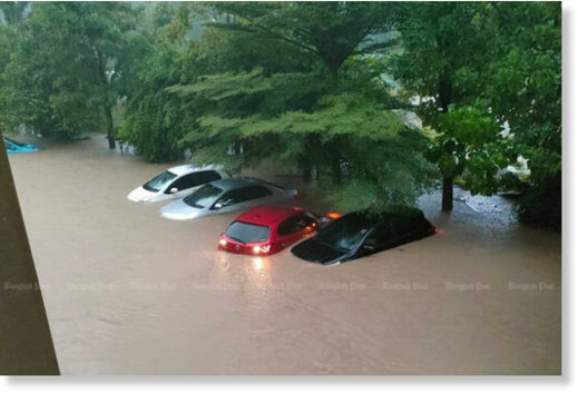 Flood water inundates cars, one