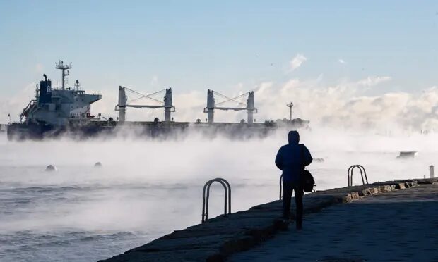 Steam rises from Boston Harbor as