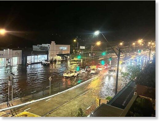 A sudden storm caused widespread flooding across Sydney on Tuesday night (pictured, vehicles travelling through floodwater in Manly)