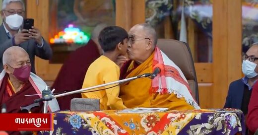 dalai lama kissing boy