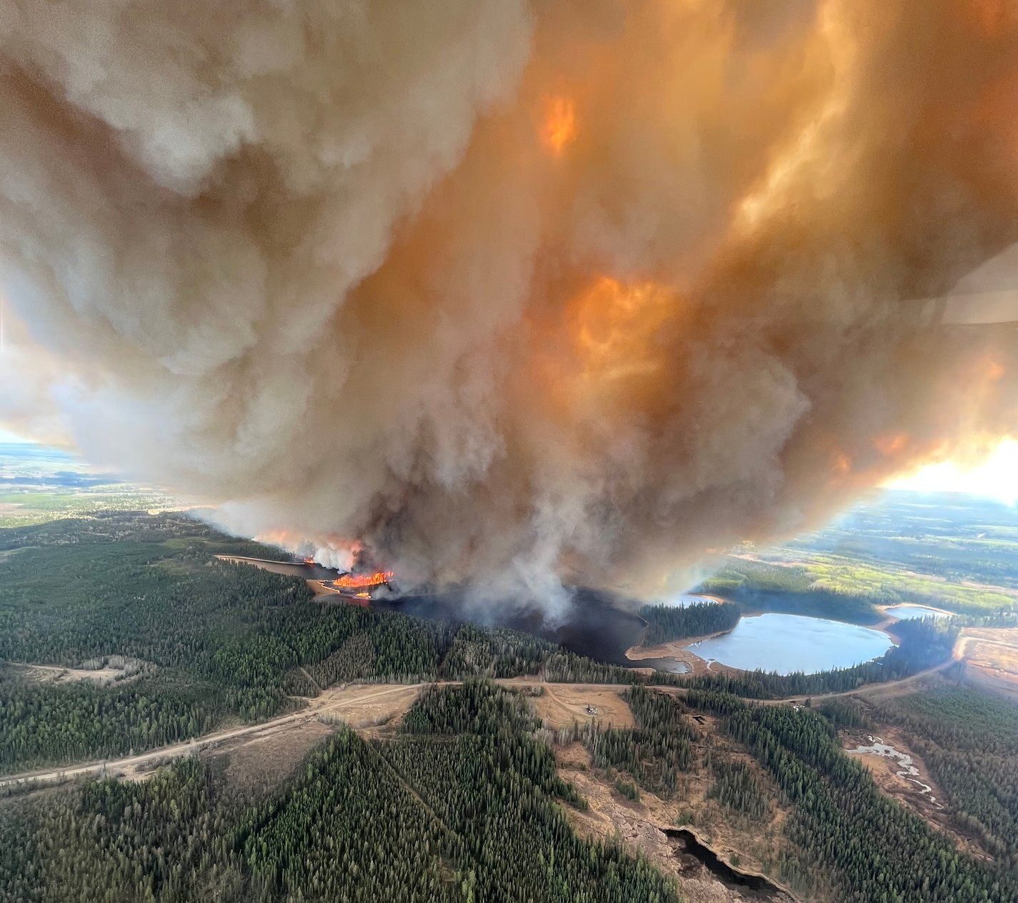 A smoke column rises from wildfire EWF031 near Lodgepole, Alberta, Canada May 4, 2023.