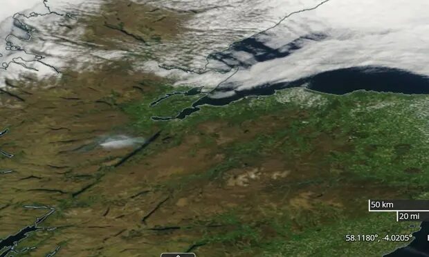 A Nasa worldview satellite photograph shows the plume of smoke from the fire at Cannich, in the hills above Loch Ness in the Highlands,