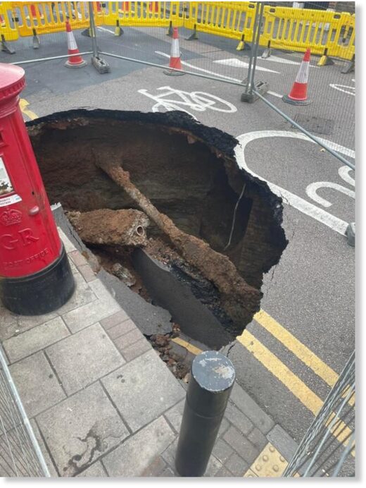 Residents initially used wheelie bins to block off the sinkhole, which emerged on Monday morning in Eltham.