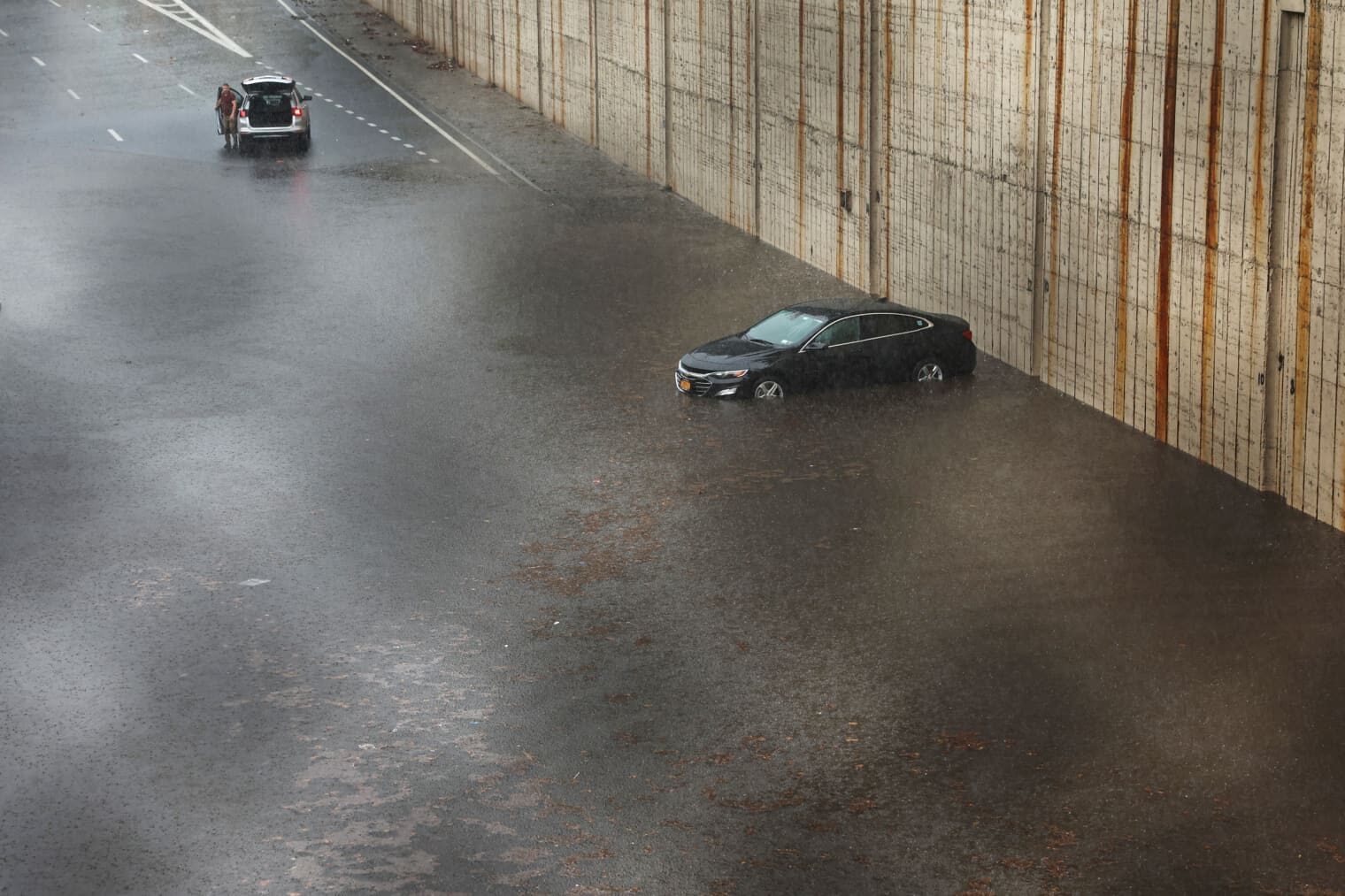 A vehicle stuck in high water on the Prospect Expressway in Brooklyn on Friday.