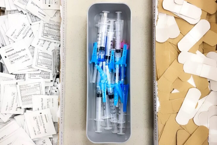 swabs syringes bandaids vaccine supplies
