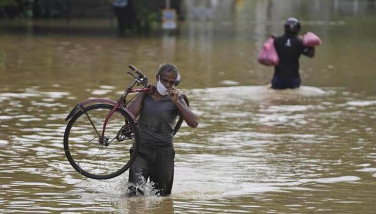 Heavy rain triggered floods and mudslides and downed trees in many parts of Sri Lanka.