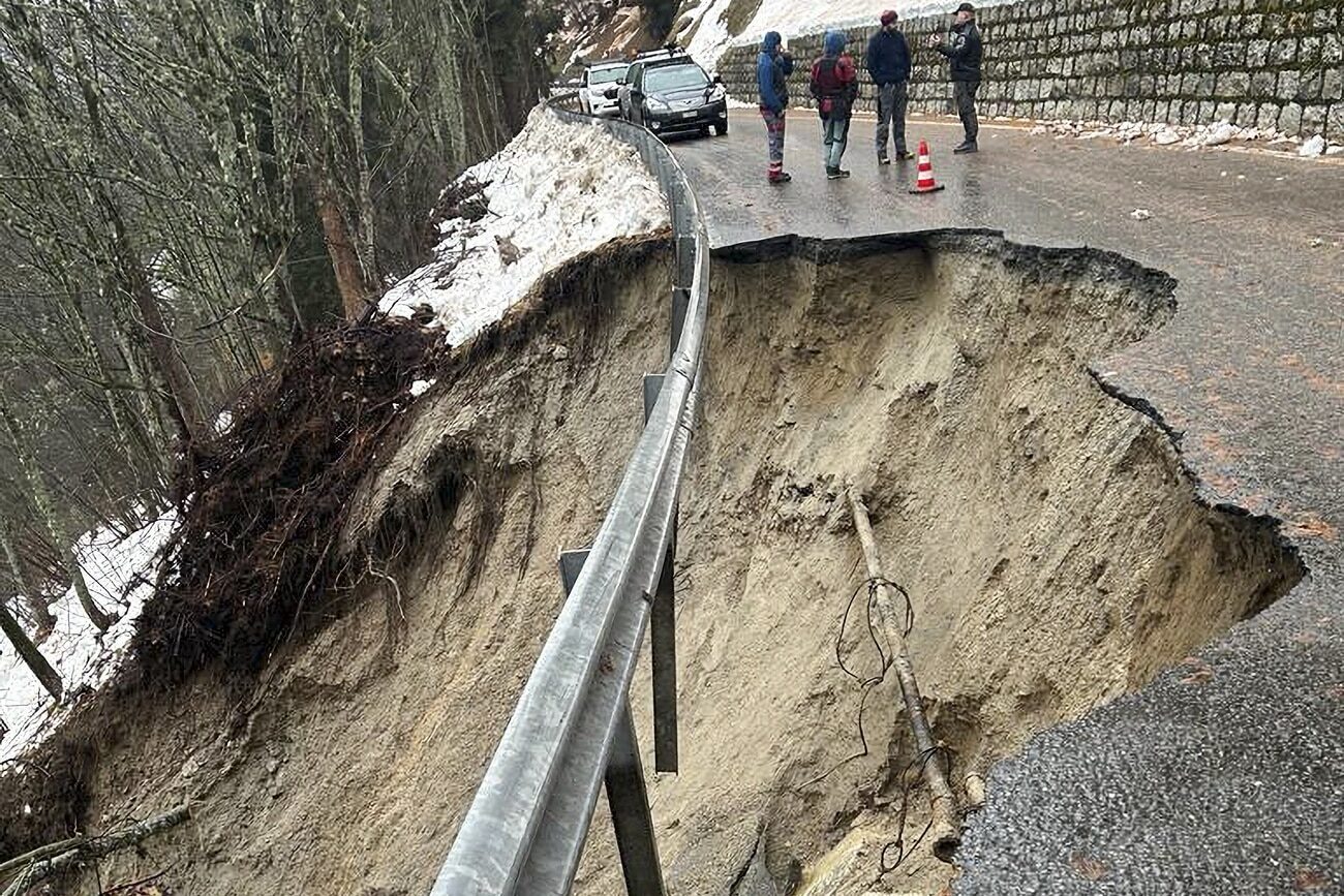 The road between Les Valettes and Champex, near Orsieres in canton Valais, subsided after heavy rain on Tuesday December 12, 2023.