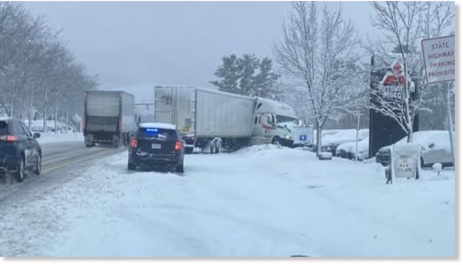 A crashed tractor-trailer truck in Auburn, Massachusetts, on Saturday, April 12, 2025.