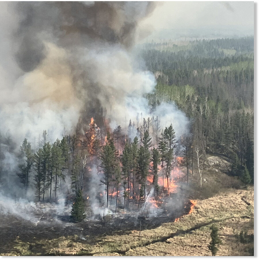 A photo released by the government of Manitoba shows a wildfire burning near the town of Lac-du-Bonnet.
