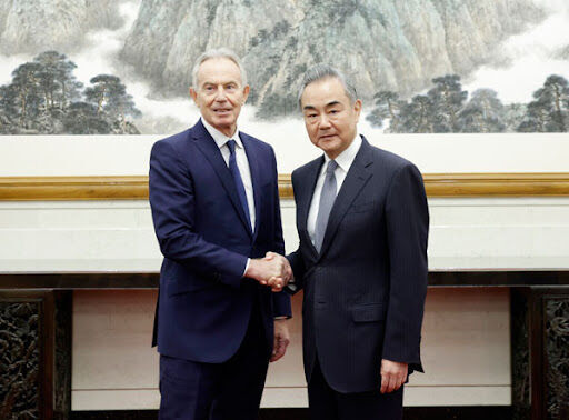 Wang Yi y Tony Blair