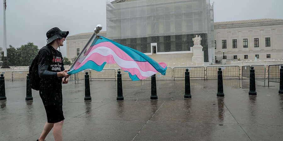 transgender protester rain