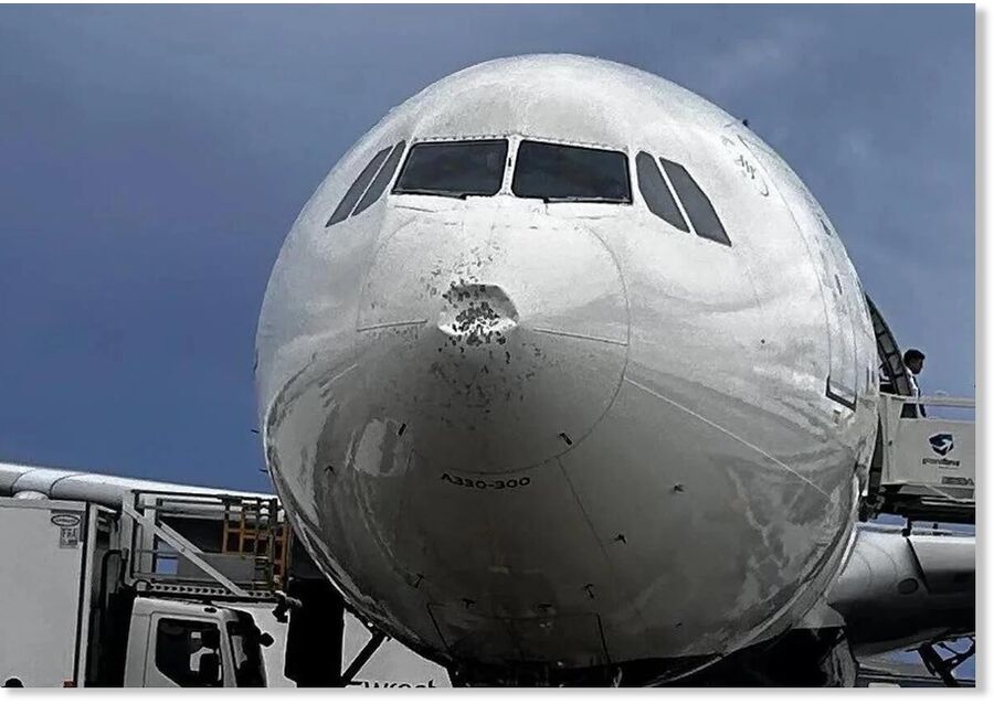 Image of the aircraft with the front part damaged.