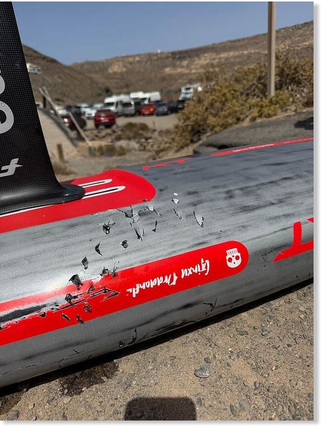 His damaged hydrofoil surfboard revealed the extent of the attack