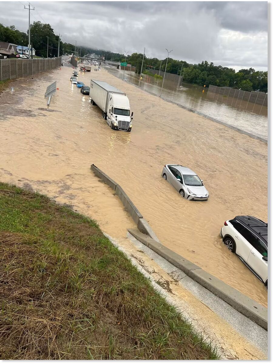 Major flooding trapped cars and shut down parts of Interstate 24 on Tuesday.