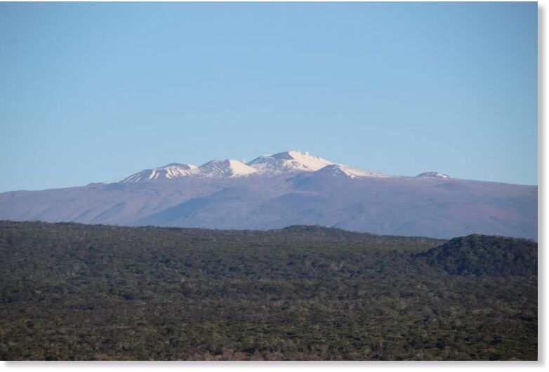 On February 3, 2025, USGS Hawaiian Volcano Observatory crews on a monitoring overflight of Kīlauea summit had excellent views of the snow-capped Mauna Kea.