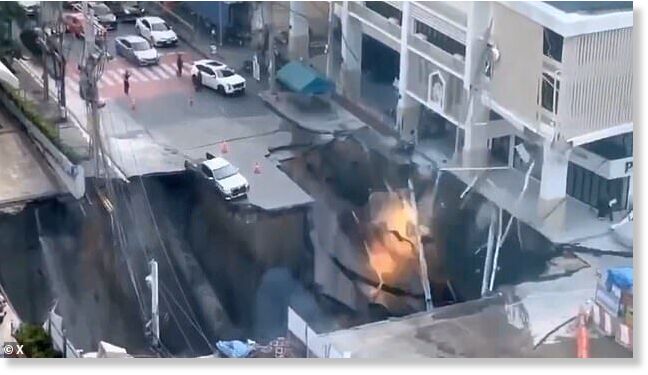 Vehicles were seen attempting to reverse as the floor opened up while pedestrians ran away from the site