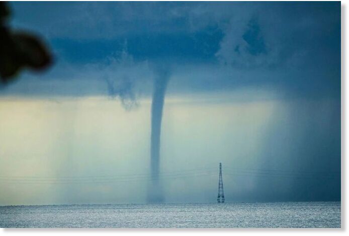 The waterspout appears near the Bai Vong Port in Phu Quoc, Oct. 10, 2025.