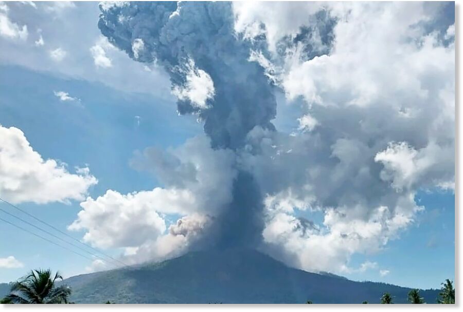 Mount Lewotobi Laki Laki spewing volcanic material during an eruption in East Flores, Indonesia, on Wednesday.