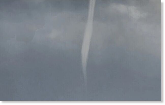 Robert said the waterspout was around 1km off the coast of Muriwai Beach.