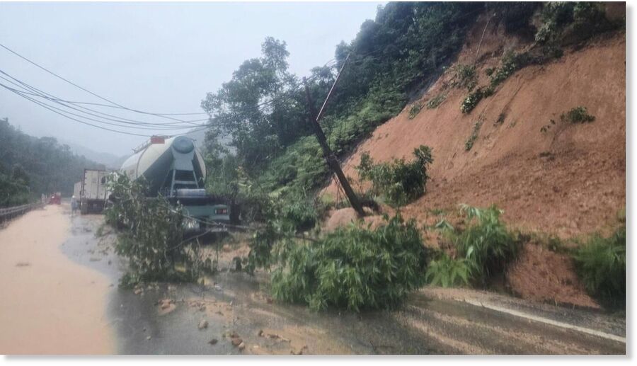 Landslides block the road on Khanh Le pass, near the location where a passenger bus was buried by a landslide in Khanh Hoa, Vietnam, Monday, Nov. 17, 2025.